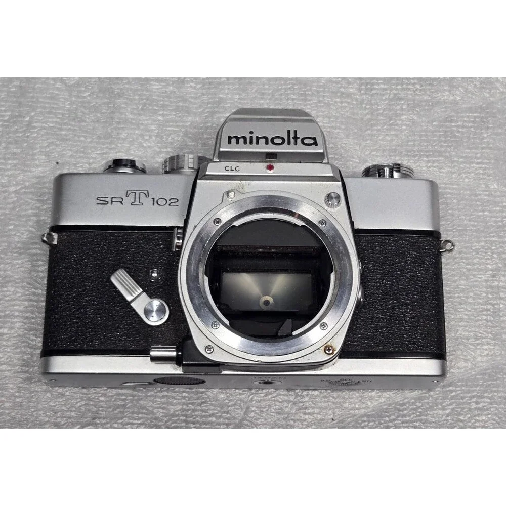 Minolta SRT 102 35mm Film Camera Body, Chrome (UNTESTED For Parts or Repair)